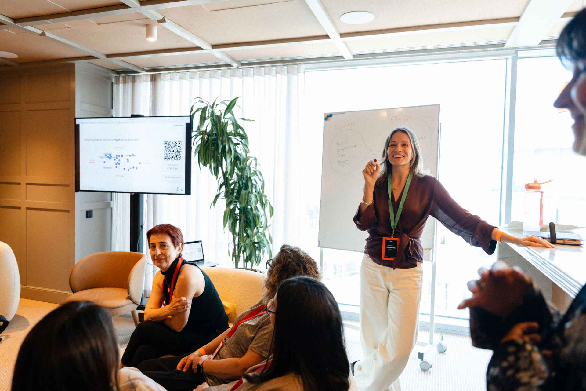 Chloë leading a workshop with a group